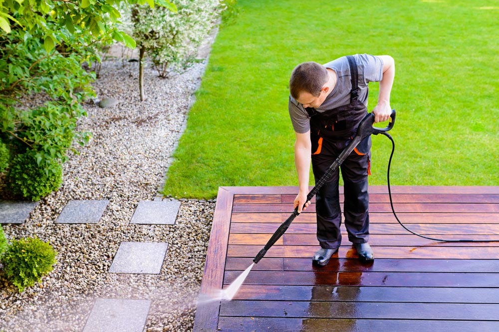 Cleaning Terrace With A Power Washer